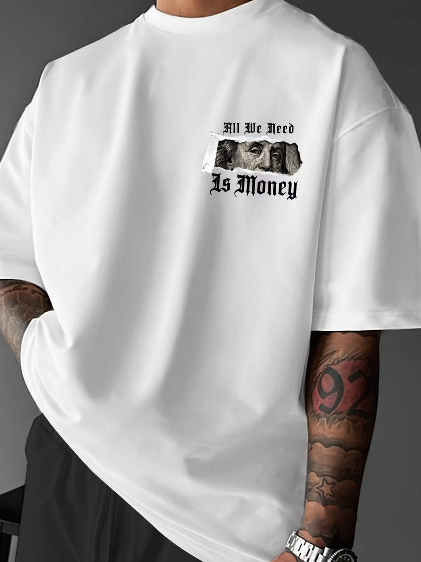 Herren T-Shirt – „All We Need Is Money“
