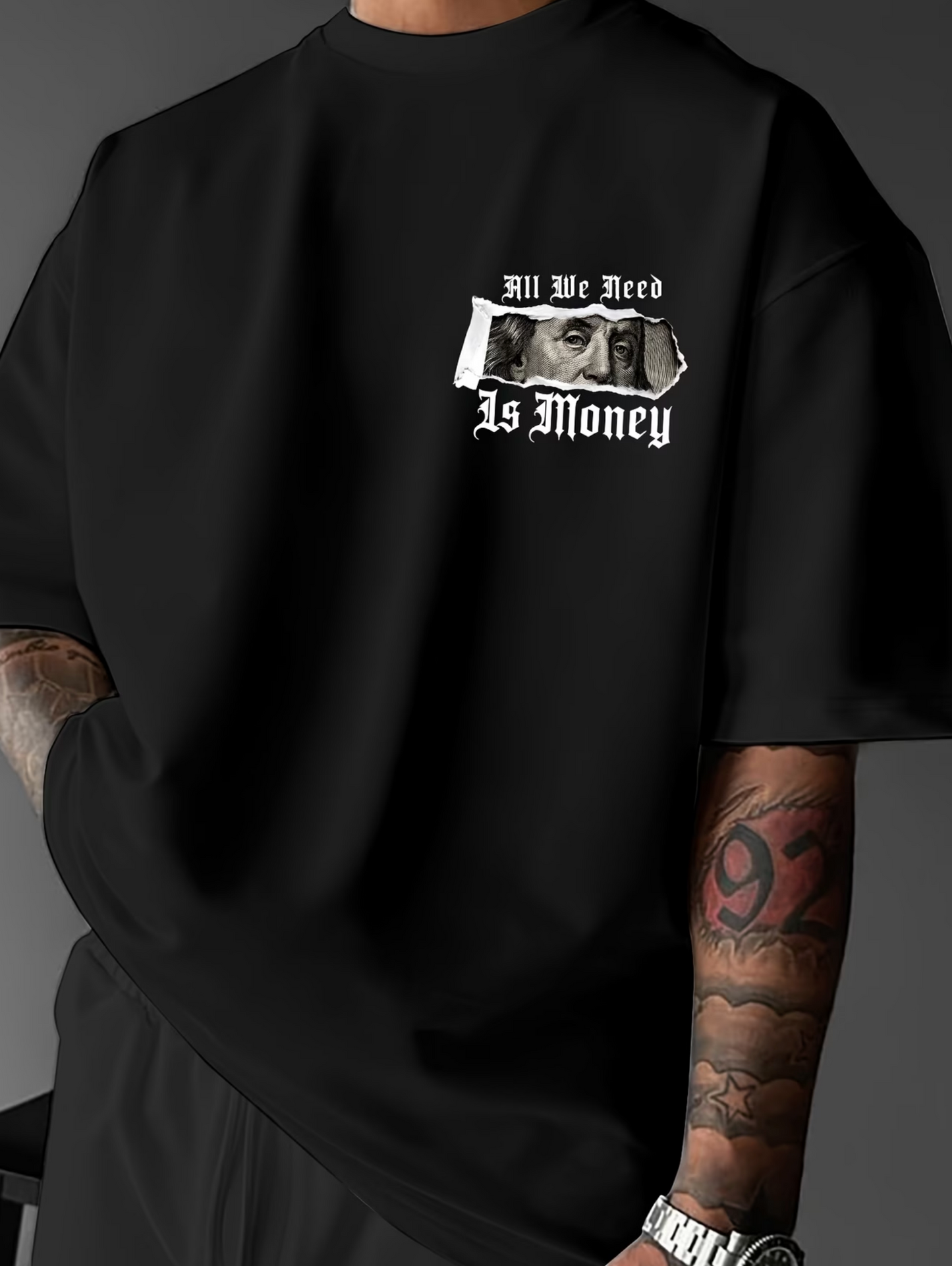 Herren T-Shirt – „All We Need Is Money“